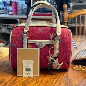 Michael Kors pink travel mini Jet Set bag
